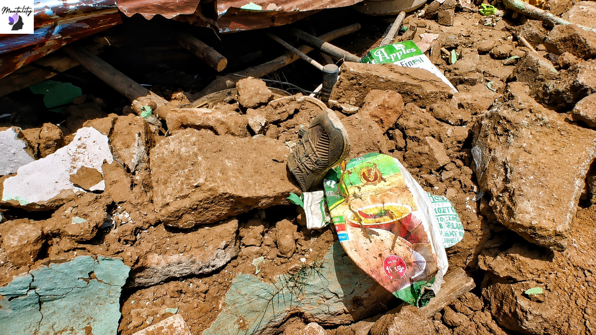 Household belongings and debris lie scattered after the demolition during the anti-encroachment drive